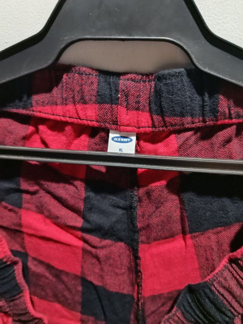Old Navy Red Plaid Pajama Pants XL (Category: Other Bottoms) located in Subic. Submitted by yssacollection (Listing ID 1429493968, Image 2). Description: Old Navy pajama pants in a red and black plaid pattern. Features an elastic waistband with a drawstring. The size is XL. The pants appear to be made of a soft, comfortable fabric, perfect for lounging. The pants have a relaxed fit..