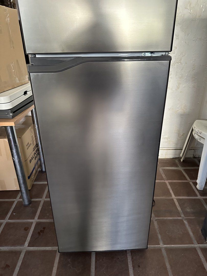 Panasonic NR-BP280VS Inverter Refrigerator (Category: Refrigerators and Freezers) located in Muntinlupa City. Submitted by rantila (Listing ID 1429400948, Image 3). Description: Panasonic NR-BP280VS Inverter refrigerator. Features a top freezer and a stainless steel finish. Includes multiple shelves and compartments inside the refrigerator and freezer. The refrigerator has a temperature and cold air control guide. Model number is NR-BP280VS and s