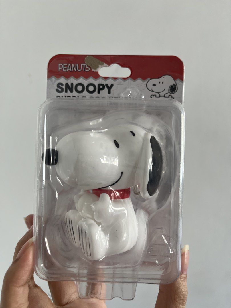 Peanuts Snoopy Bubble Pop Keyring (Category: Character Goods) located in Quezon City. Submitted by andreasy2 (Listing ID 1429430746, Image 1). Description: Snoopy bubble pop keyring from the Peanuts series. The keyring features Snoopy in a sitting pose with a red collar. The item is still in its original packaging..