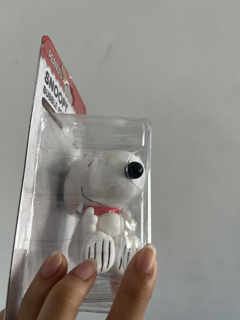 Peanuts Snoopy Bubble Pop Keyring (Category: Character Goods) located in Quezon City. Submitted by andreasy2 (Listing ID 1429430746, Image 3). Description: Snoopy bubble pop keyring from the Peanuts series. The keyring features Snoopy in a sitting pose with a red collar. The item is still in its original packaging..