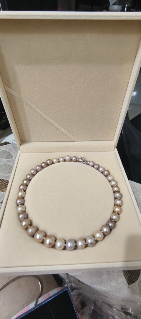 Edison Pearl Necklace (lilac, pink, peach) 11-12mm (Category: Necklaces) located in Batangas. Submitted by decluttering_bliss (Listing ID 1429452476, Image 1). Description: Edison Pearl Necklace.