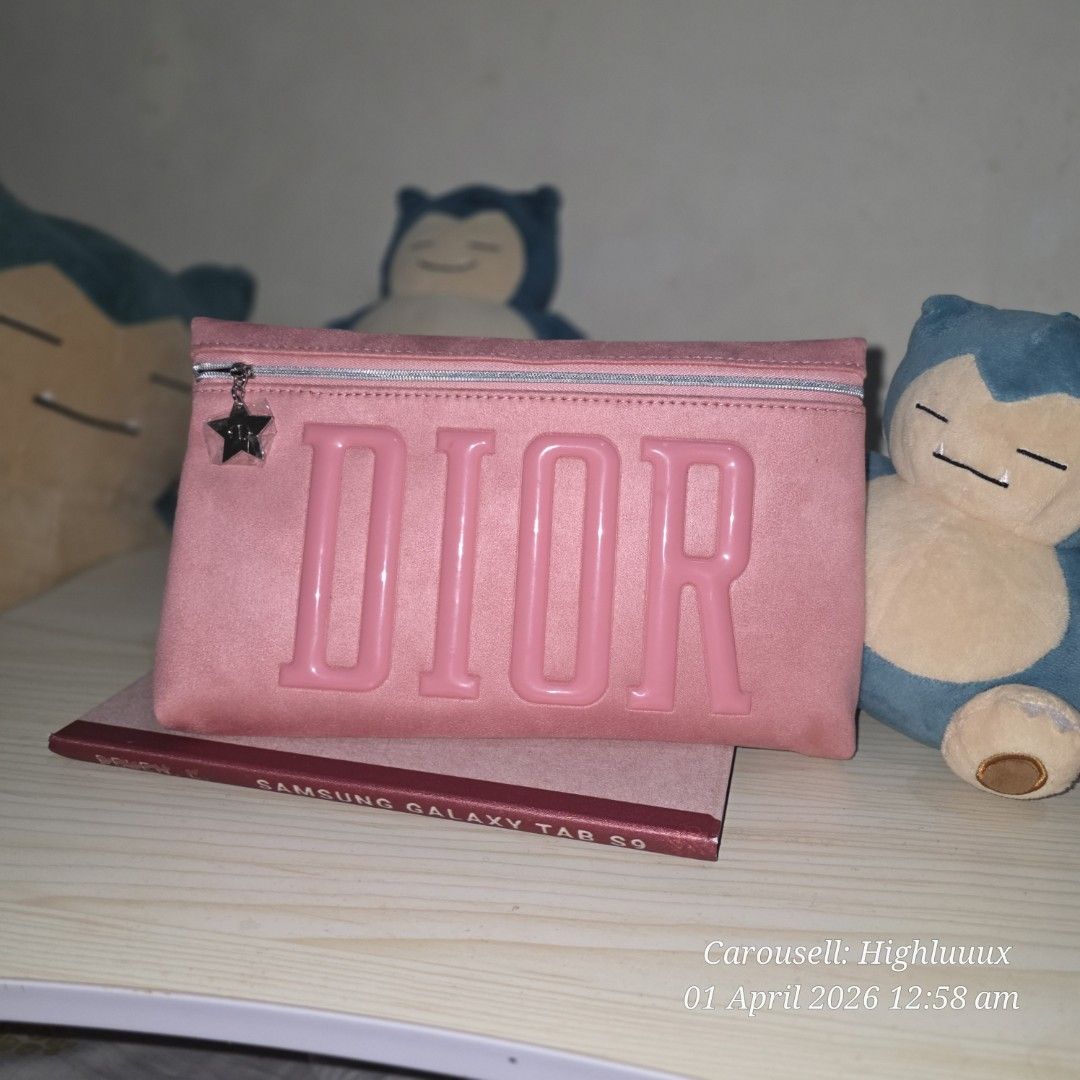 DIOR PINK VIP Gift Vanity Bag (Category: Luxury Bags & Wallets) located in Pasay City. Submitted by highluuux (Listing ID 1429489806, Image 2). Description: -Same size with 11 inch Galaxy Tablet -Can fit Kindle paperwhite 11th gen. -New with box. Opened only to check but did not use since 11 inch tablet cannot fully fit. TMI tho SKL: *I love this especially its color. I only bought this as pouch for my tablet but it did not really fit and also I 