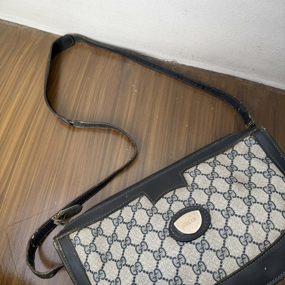 Pre Owned Authentic GUCCI GG Vintage Bag (Category: Luxury Bags & Wallets) located in Paranaque City. Submitted by Glamfahd (Listing ID 1429347802, Image 3). Description: Pre Owned Authentic GUCCI GG Bag Inclusion/s: None Condition Well Used condition Marks on exterior Marks on interior Dirt on exterior Silver zipper puller conmected to the main zipper closure has been removed but still useable. Bag is really a great buy! Please manage your expec