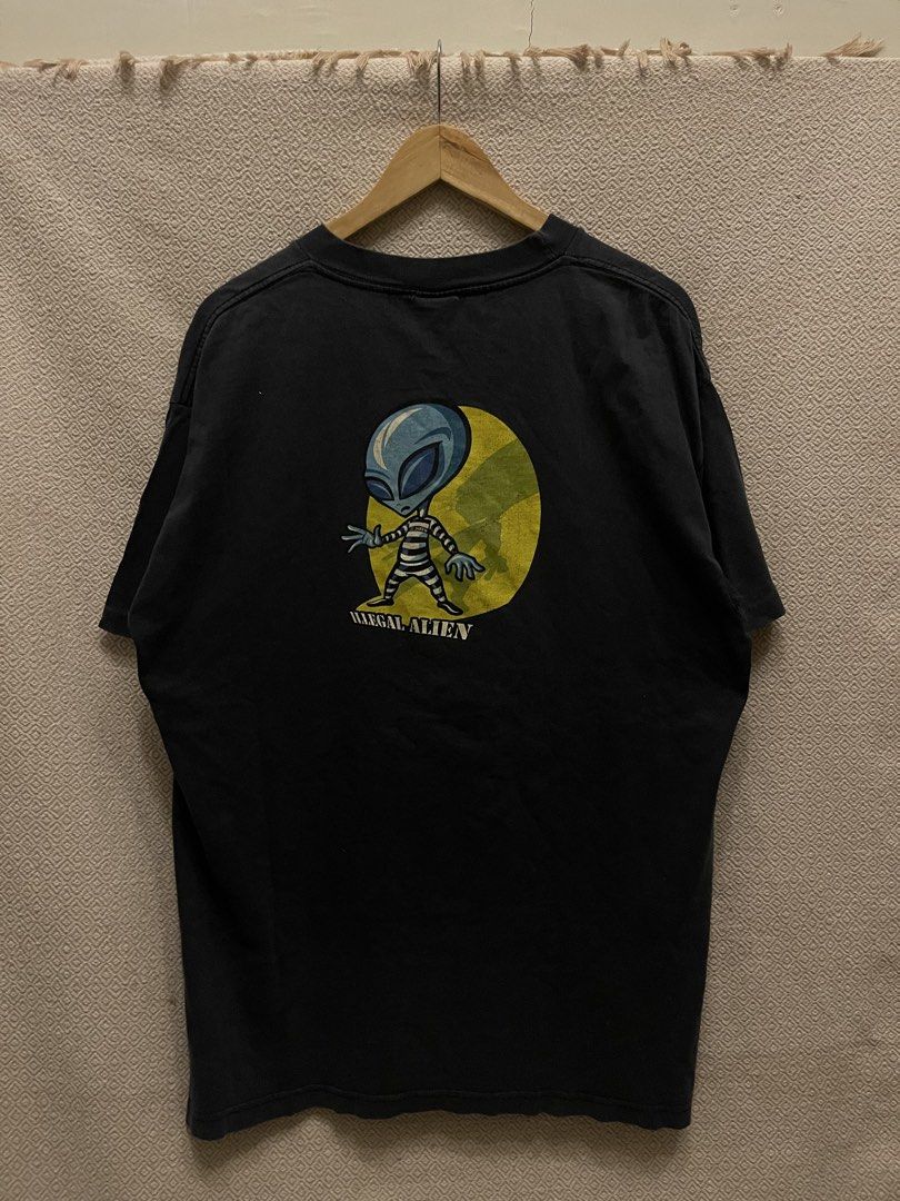 Rare vintage 26 Red Illegal Alien Graphic Tee - Large (Category: Tshirts & Polo Shirts ) located in Manila. Submitted by hypestock_mnl (Listing ID 1429368648, Image 1). Description: - rare vintage 26 Red Illegal Alien Graphic Tee - Size: Large - Features a unique alien graphic on the back - 26 Red logo on the front - Made from 100% cotton - single stitch all the way.