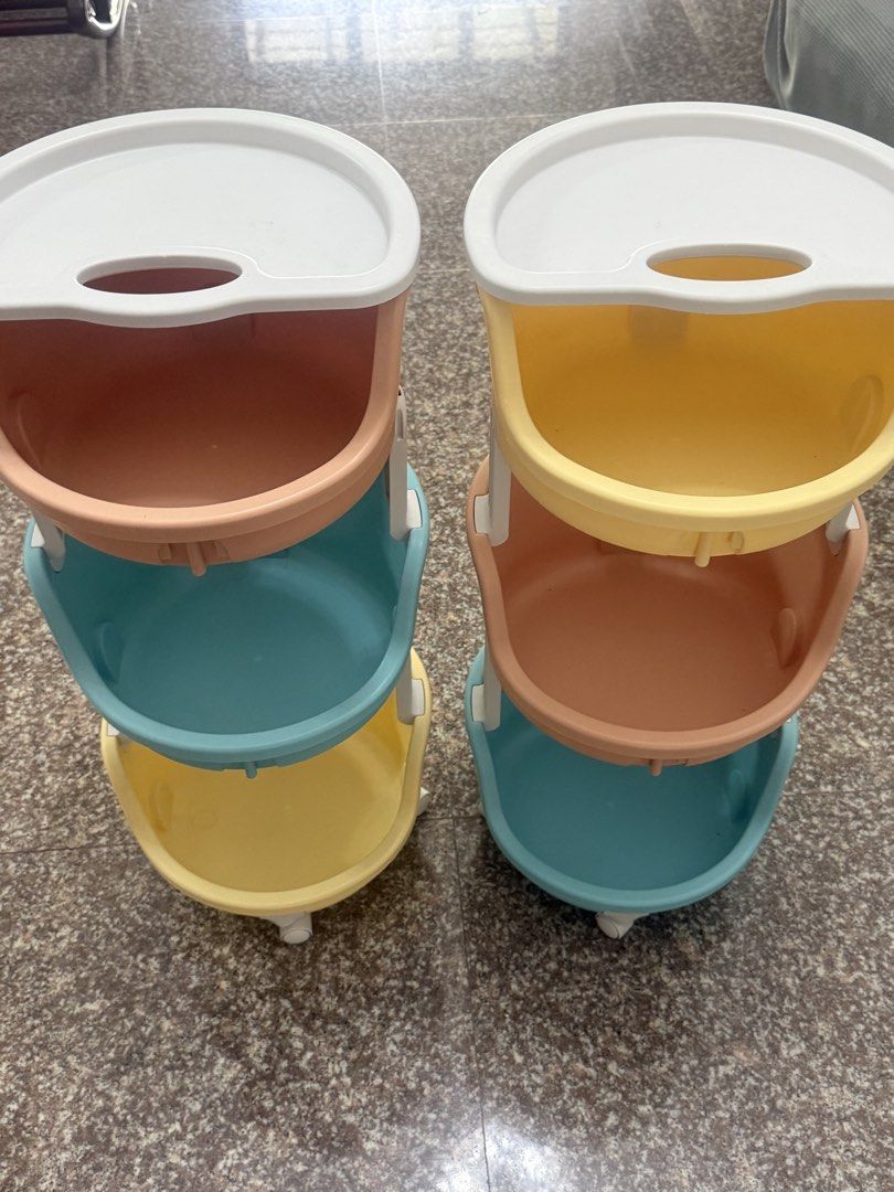 Stackable Storage Organizer Baskets (Category: Storage Boxes & Baskets) located in Singapore. Submitted by tch88 (Listing ID 1429346506, Image 2). Description: Set of stackable storage organizer baskets in various colors. Each basket has a handle and a lid. Great for organizing items in your home. Easy to assemble and disassemble. Perfect for storing toys, snacks, or other small items..