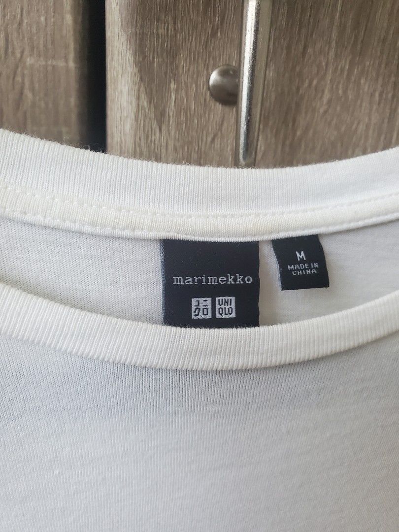 UNIQLO MARIMEKKO shirt (Category: Shirts) located in Cavite. Submitted by sameoreo (Listing ID 1429352490, Image 2). Description: PH300 - not including sf fault: small stain on collar area as seen in pic rfs: decluttering NO REFUND NO CANCELLING loc: bacoor, cavite mop: gcash - payment first mod: lalamove/j&t - buyer book and shoulder sf 𓂃ෆ˚.