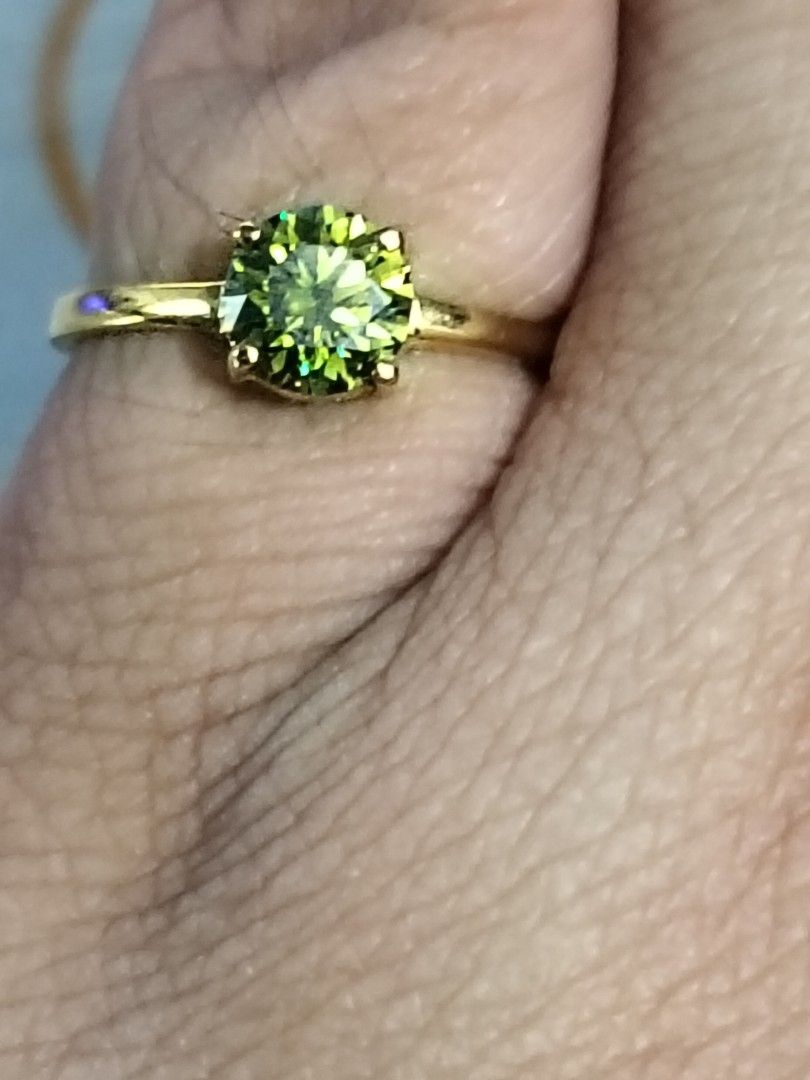 10k Gold Ring with 1ct green moisa (Category: Rings) located in Imus. Submitted by timelessfindph (Listing ID 1424663017, Image 2). Description: - newly crafted - 10k Gold ring with 1ct round-shaped green moisa stones - Green Moisa Stones have a vibrant dark green color - Perfect for everyday wear - 2 grams - 1ct green moisa - size 7 - no markings but tested and appriased in Palawan Pawnshop per piece only.
