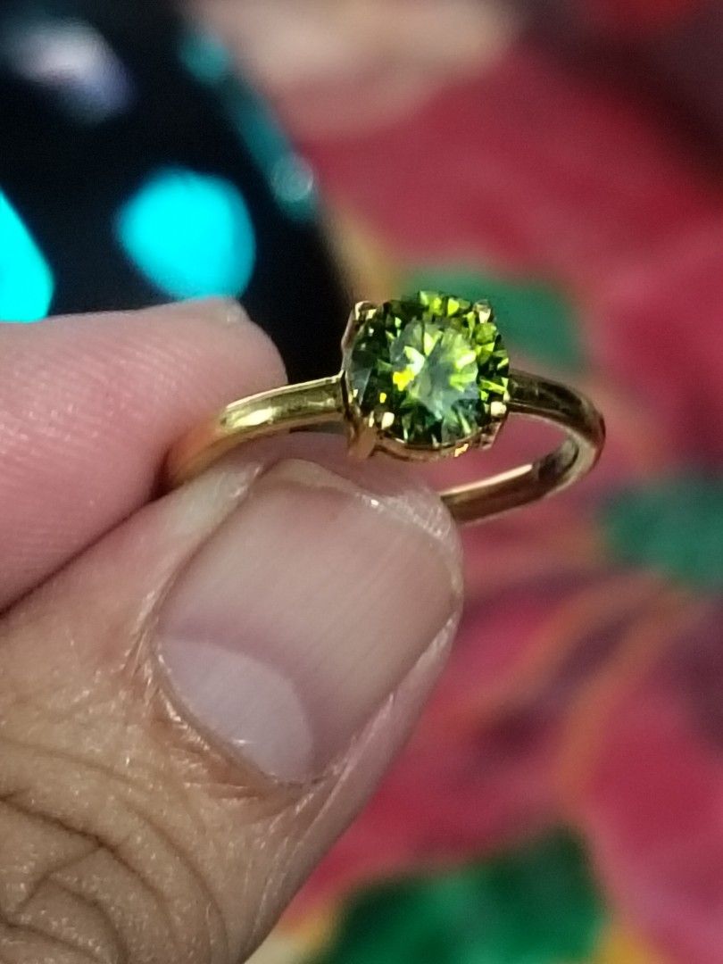 10k Gold Ring with 1ct green moisa (Category: Rings) located in Imus. Submitted by timelessfindph (Listing ID 1424663017, Image 1). Description: - newly crafted - 10k Gold ring with 1ct round-shaped green moisa stones - Green Moisa Stones have a vibrant dark green color - Perfect for everyday wear - 2 grams - 1ct green moisa - size 7 - no markings but tested and appriased in Palawan Pawnshop per piece only.