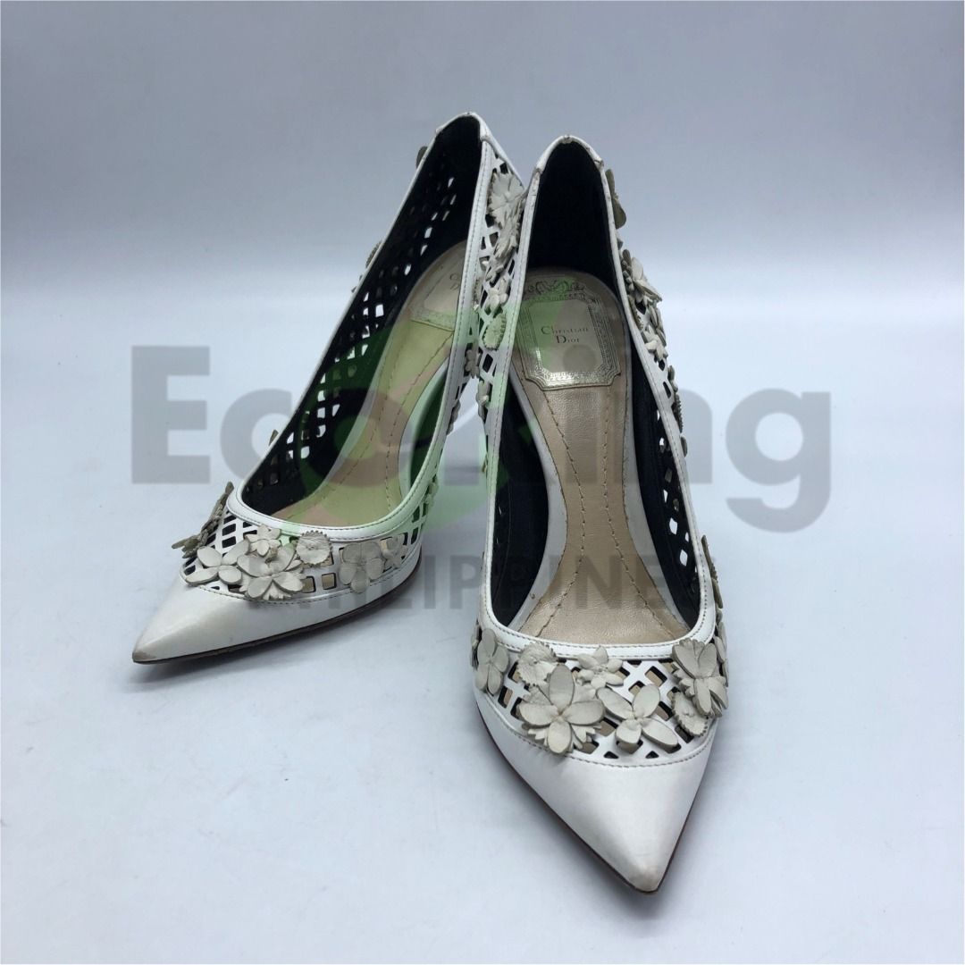 SALE!!!! 267001758 DIOR SHOES HEELS FLORE (Category: Sneakers & Footwear) located in Taguig. Submitted by ecoring.ph (Listing ID 1424580313, Image 1). Description: ◆CONDITION: B ◆DESCRIPTIONS: (Other defects/info:) The body of the shoes is scratched, scuffed, stained, dirty, wrinkled, and has press marks. It also appears discolored, particularly on the flower designs. The toe box has a deep scratch. The heel is scratched, scuffed, dirty, and has 