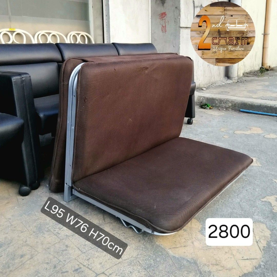 2nd hand Single Low Folding Bed with Brown Fabric (Category: Bed Frames & Mattresses) located in Paranaque City. Submitted by 2ndcharmfurniture (Listing ID 1424642045, Image 1). Description: Folding bed features a brown fabric and a sturdy metal frame. It can be folded for easy storage and transport. Dimensions when folded: L95 W76 H70cm. When unfolded: L193 W95 H12-73cm. It is ideal for small spaces or as an extra bed for guests..