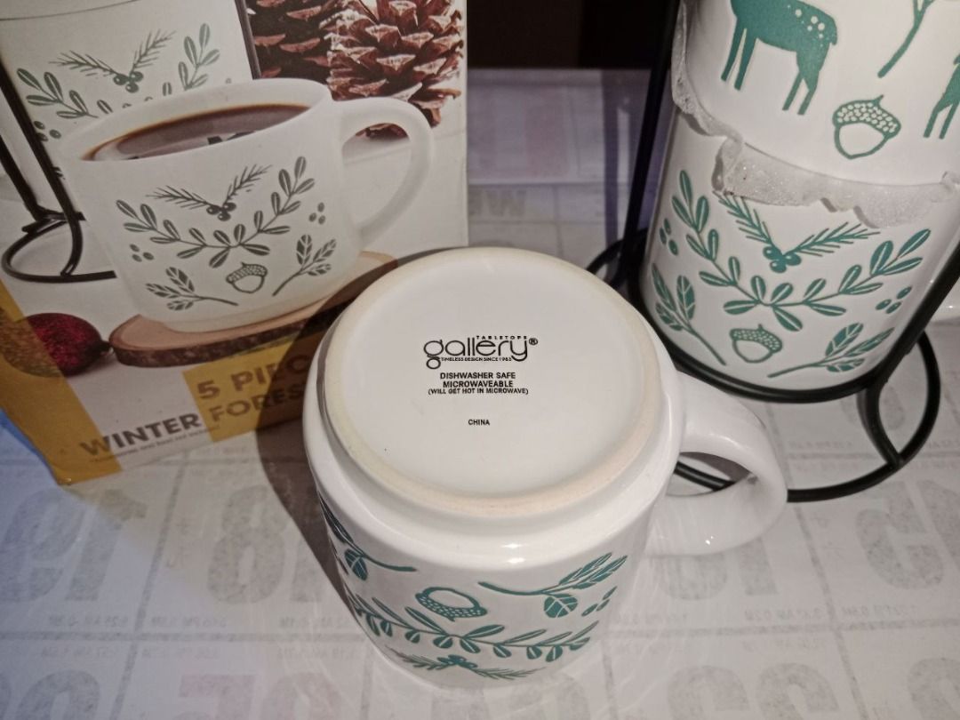 4 coffee mugs with rack, 473 ml each - Gallery Tabletops (Category: Coffee & Tea Tableware) located in Bayambang. Submitted by lucky_faststar_74a229 (Listing ID 1424667057, Image 2). Description: Winter forest mug set 4 mugs ( 473 ml each) 1 rack With box.