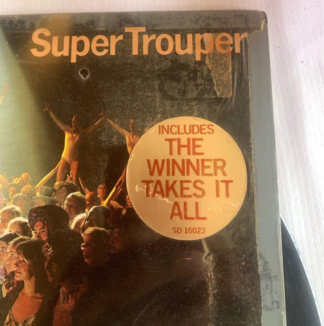 Vintage ABBA - Super Trouper Vinyl Record (Category: Vinyls) located in Calasiao. Submitted by beardmodefinds0707 (Listing ID 1424549464, Image 2). Description: - ABBA "Super Trouper" Vinyl Record - Features the hit song "The Winner Takes It All" - Vintage condition - Classic album cover art - Perfect for ABBA fans and vinyl collectors - Meetup available at Robinsons Place Pangasinan - with music lyrics - Tested and working with video - Vintage g