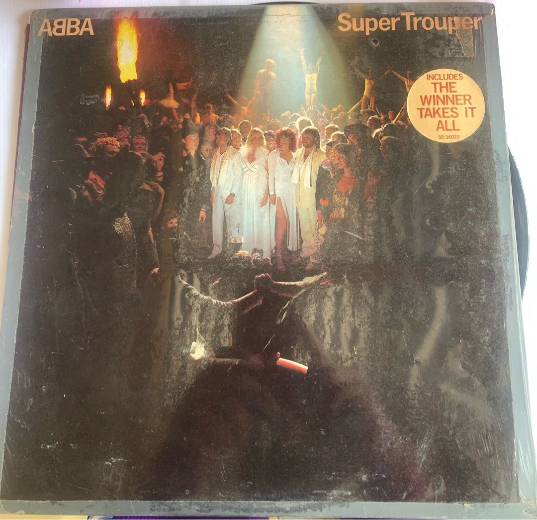 Vintage ABBA - Super Trouper Vinyl Record (Category: Vinyls) located in Calasiao. Submitted by beardmodefinds0707 (Listing ID 1424549464, Image 1). Description: - ABBA "Super Trouper" Vinyl Record - Features the hit song "The Winner Takes It All" - Vintage condition - Classic album cover art - Perfect for ABBA fans and vinyl collectors - Meetup available at Robinsons Place Pangasinan - with music lyrics - Tested and working with video - Vintage g