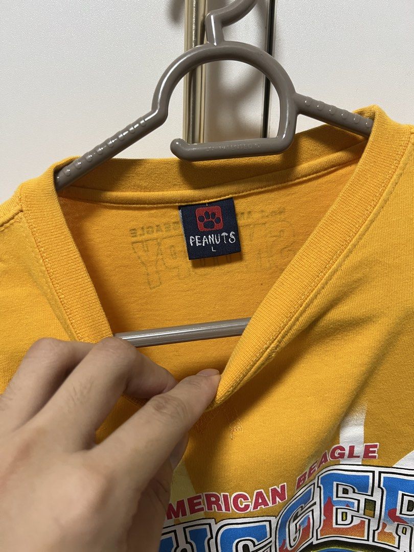 American Beagle Snoopy Baseball T-shirt (Category: Tshirts & Polo Shirts ) located in Manila. Submitted by hatdognablue (Listing ID 1424552436, Image 2). Description: - Yellow Snoopy baseball t-shirt - Size: L - Front print: "SLUGGER" and "Snoopy Loves Baseball" - Back print: "No.1 AMERICAN BEAGLE SNOOPY" Vintage snoopy shirt letting it go for 350.