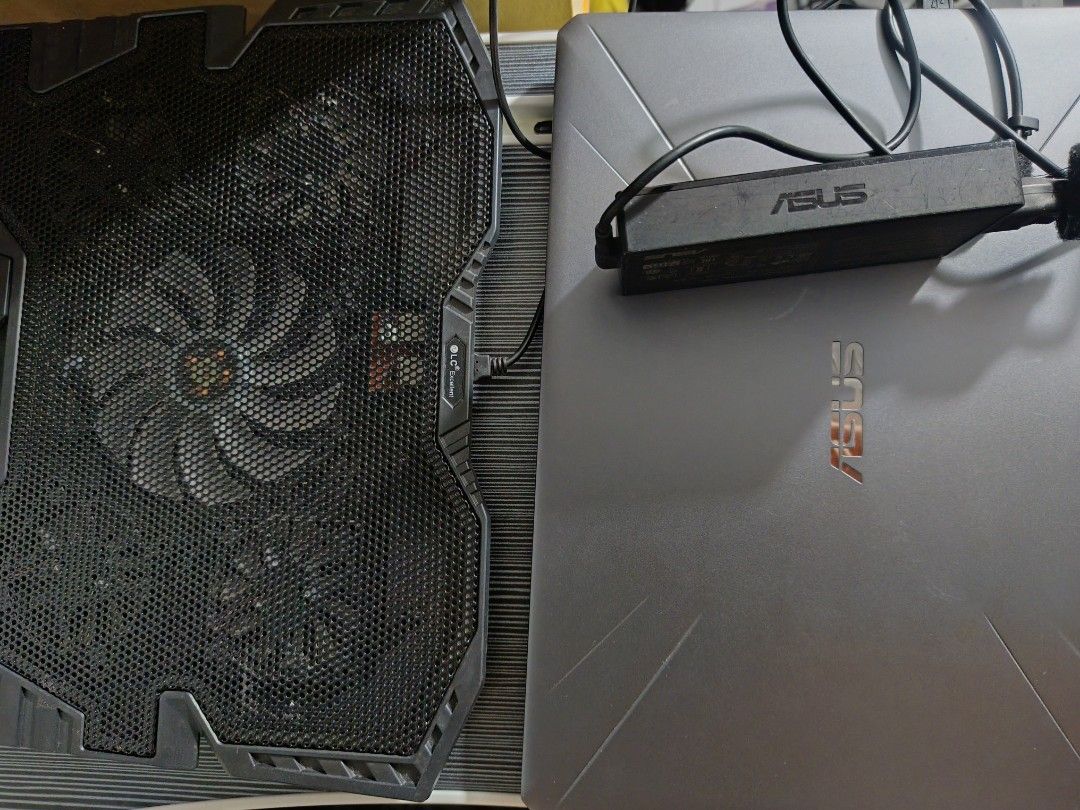 ASUS TUF Gaming Laptop Ryzen 7 (Category: Laptops & Notebooks) located in Manila. Submitted by amddeib (Listing ID 1424633537, Image 2). Description: hairline on body missing letter e unit and charger only all working keyboard with lc laptop cooler with asus bag .