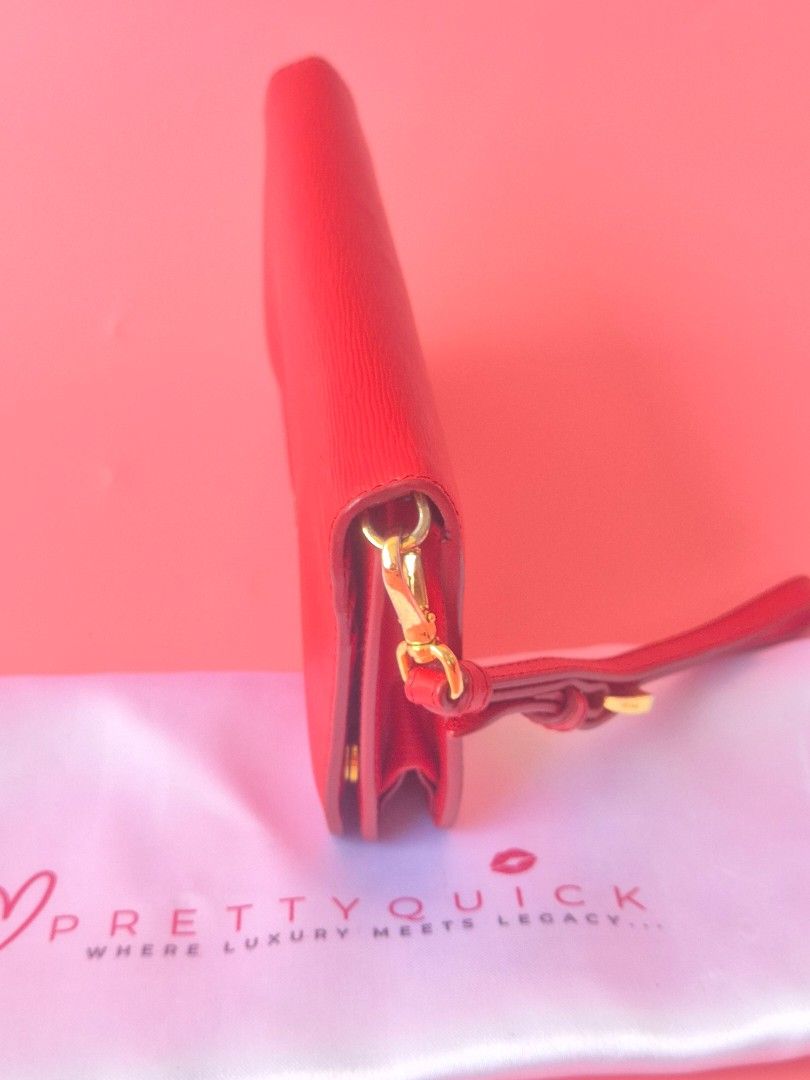 Authentic Prada wristlet Wallet (Category: Luxury Bags & Wallets) located in Manila. Submitted by _prettyquick (Listing ID 1424534307, Image 2). Description: 100% authentic preowned Please manage your expectations follow us on IG for more Items @_prettyquick.