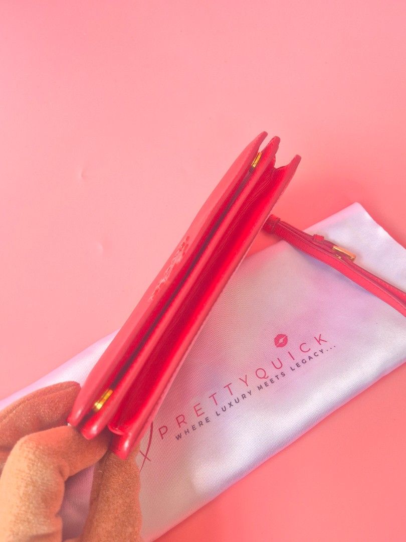 Authentic Prada wristlet Wallet (Category: Luxury Bags & Wallets) located in Manila. Submitted by _prettyquick (Listing ID 1424534307, Image 3). Description: 100% authentic preowned Please manage your expectations follow us on IG for more Items @_prettyquick.