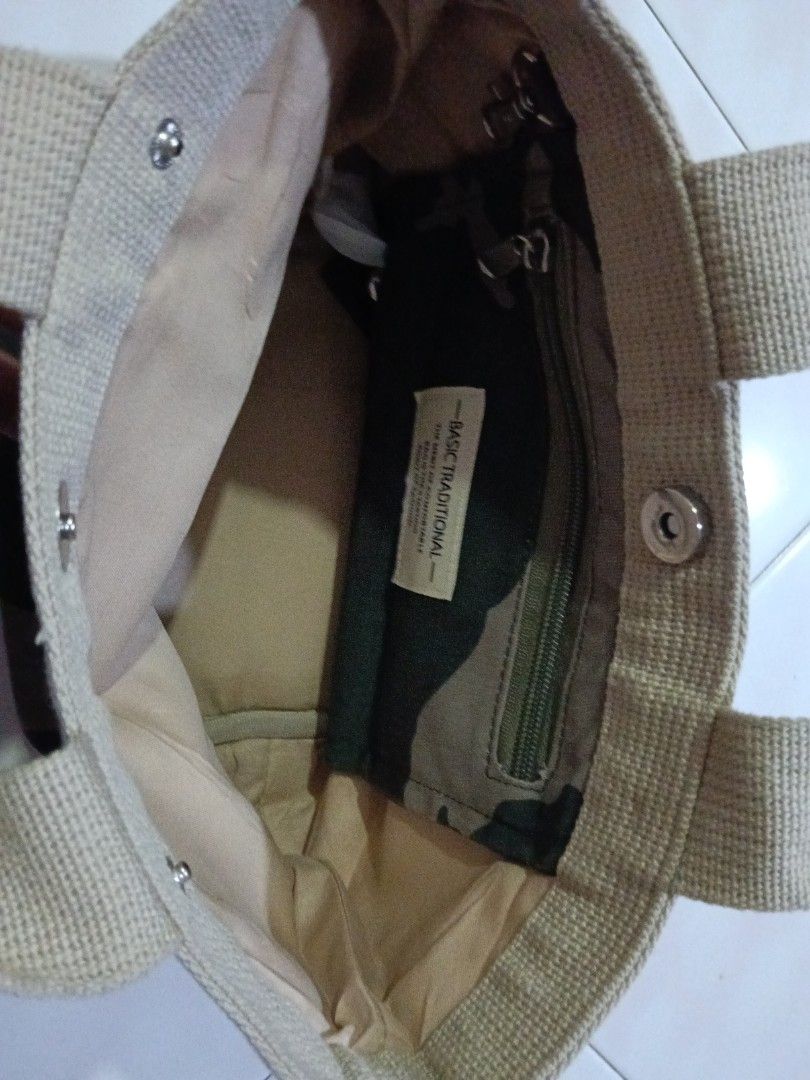 Basic Traditional Camouflage Bucket Tote Bag (Category: Tote Bags) located in Kluang. Submitted by ybbandels (Listing ID 1424585127, Image 2). Description: - Camouflage pattern tote bag - sizing XS - Beige handles and trim - Snap closure - Interior zippered pocket - Made of canvas - Brand: "Basic Traditional".