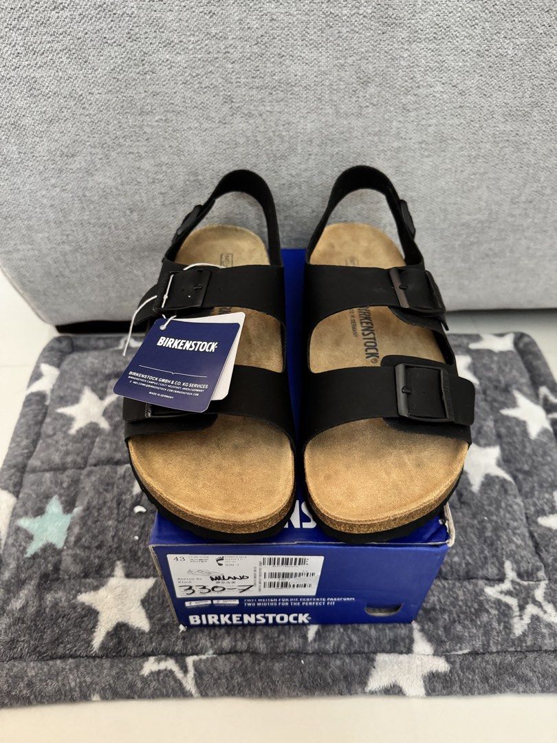 Birkenstock Milano Black Sandals (Category: Slippers & Slides) located in Taguig. Submitted by declutterme12 (Listing ID 1424533642, Image 2). Description: - Birkenstock Milano sandals - Black color - Size 43 - Adjustable straps - Classic cork footbed - Unworn condition - Comes with original box and tags - Perfect for everyday wear - Offers style and comfort.