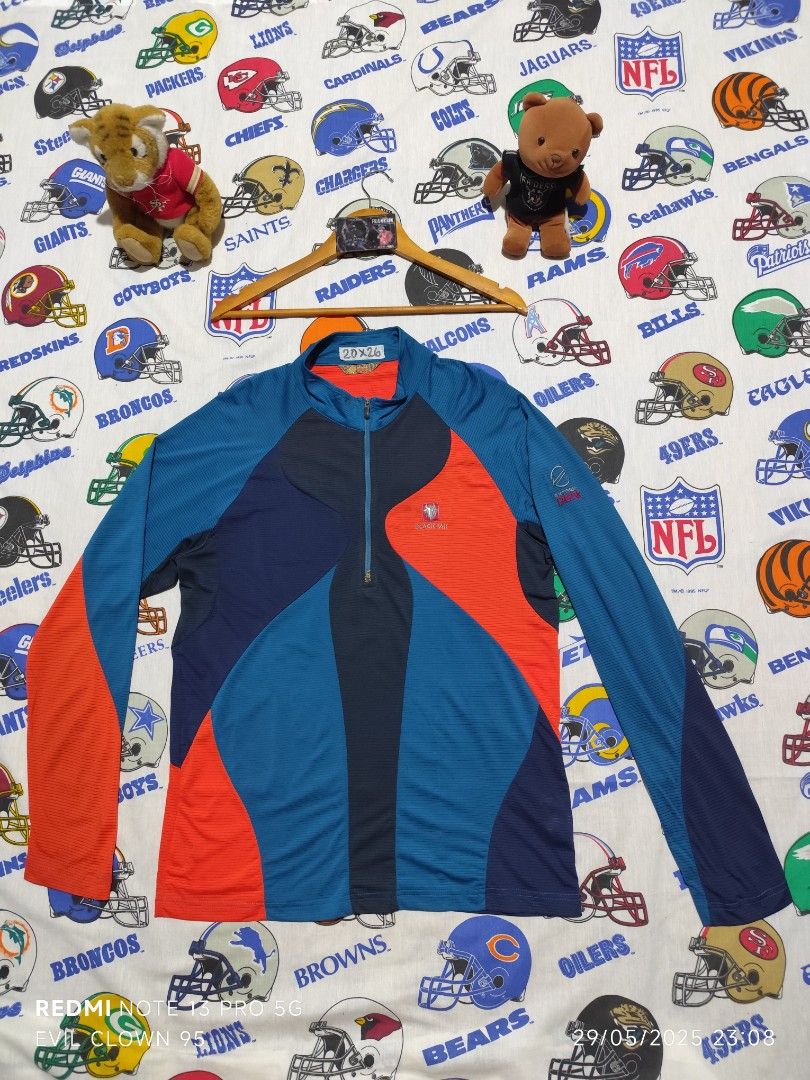 Black Yak Extreme Peak Long Sleeve Jacket (Category: Coats, Jackets and Outerwear) located in Baguio. Submitted by FRANKLIN (Listing ID 1424539832, Image 1). Description: - Black Yak Extreme Peak long sleeve jacket - Zip-up front - Color block design: blue, orange, and navy panels - Brand logo on sleeve and back - Size: 20x26 - Condition: Stain on back.