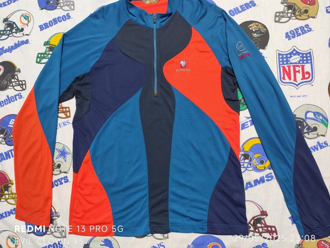 Black Yak Extreme Peak Long Sleeve Jacket (Category: Coats, Jackets and Outerwear) located in Baguio. Submitted by FRANKLIN (Listing ID 1424539832, Image 2). Description: - Black Yak Extreme Peak long sleeve jacket - Zip-up front - Color block design: blue, orange, and navy panels - Brand logo on sleeve and back - Size: 20x26 - Condition: Stain on back.