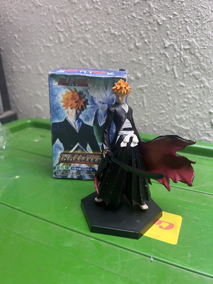 Bleach Ichigo Kurosaki Figure (Category: Figurines & Statues) located in Zamboanga. Submitted by lcomprendio26013 (Listing ID 1424591748, Image 1). Description: - Class A figure only Ichigo Kurosaki figure from Bleach. - Includes original box. - Figure is posed with his sword and cape. - Box features Japanese text and character art. - Figure is displayed on a black hexagonal base. 149 only.