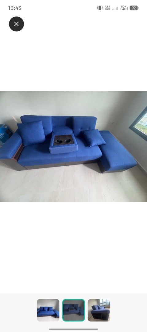 Massimo multi function sofa bed (Category: Sofas) located in Singapore. Submitted by martinerox (Listing ID 1424568880, Image 2). Description: Massimo multi function sofa bed for sale. - Stylish blue sectional sofa - Built-in storage - Includes a table - Comfortable design - Perfect for living rooms/apartments - Ready for immediate use.