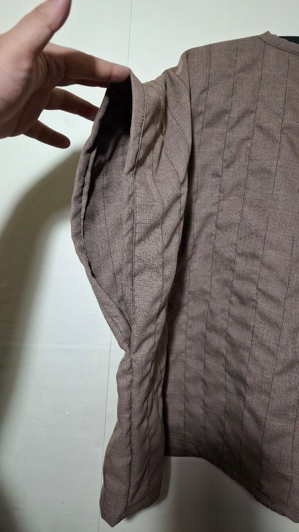 Boxy Brown Quilted Vest (Category: Vests) located in Valenzuela. Submitted by kneeko (Listing ID 1424642475, Image 3). Description: L: 25 in W: 30 in(Pit to pit) LAST PRICE POSTED! Colors of the item are not accurate to the photo due to lighting and processing. As this is a preloved item, please manage expectations :) Mode of Payment : QR Code/Bank transfer Mode of Delivery: Grab, Lalamove, JnT (buyer will shoulder the delivery fee) Inquiries/tra