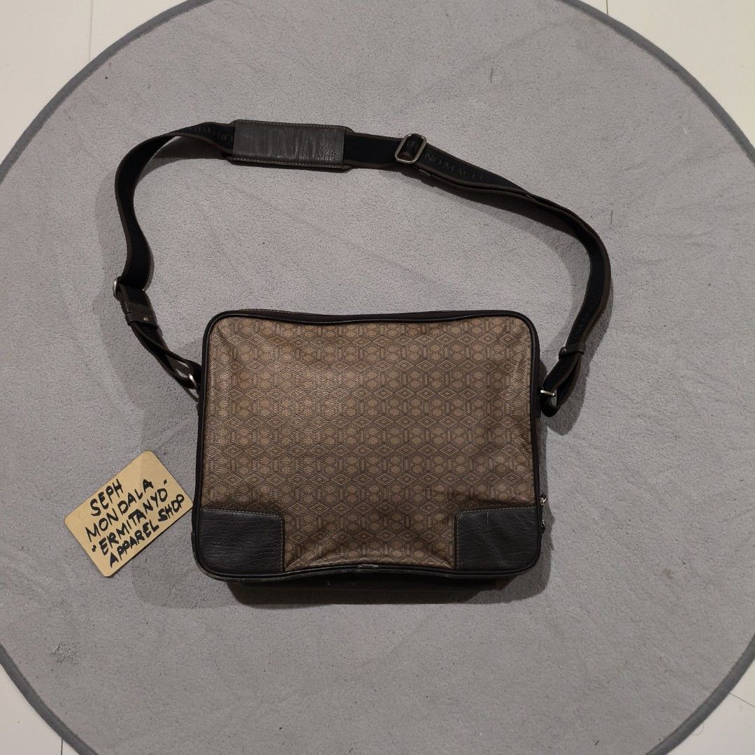Bruno Magli Messenger Bag (Category: Luxury Bags & Wallets) located in Calatrava. Submitted by ermitany0 (Listing ID 1424661176, Image 1). Description: - Bruno Magli messenger bag - Geometric pattern - Shoulder strap - Zipper closure - Brown and black color scheme - Interior patterned lining - "KUM KANG" tag inside - Made in Korea - width x length: 13.5x10.5 - flaws: fade and scratches - please check photos for more details ✅ location: Negros Occ