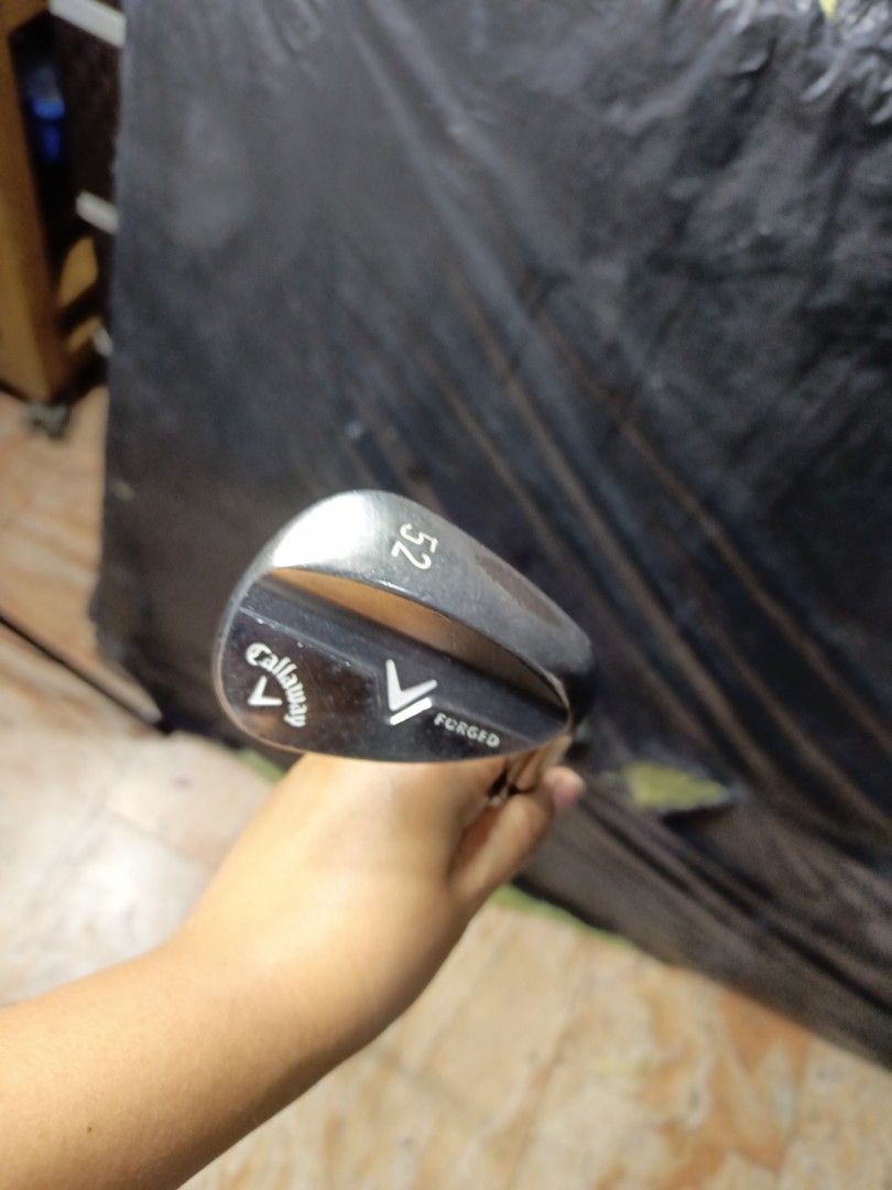 Callaway Forged 52 Degree Wedge (Category: Golf) located in Manila. Submitted by yeonmei5614747 (Listing ID 1424527708, Image 2). Description: - Callaway Forged 52-degree wedge - Club head shows visible wear - Designed for precision shots around the green - Versatile for various course conditions - Helps achieve optimal spin and control.