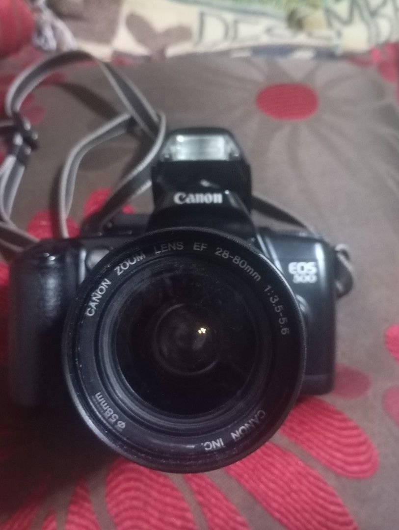 Canon EOS 500 Camera with Lens (Category: Cameras) located in Pasay City. Submitted by urquincyy (Listing ID 1424638971, Image 3). Description: The Canon EOS 500 ~ user-friendly features,recommended as an affordable entry-level camera for film photography. Key Features & Specifications: ▪️Type: 35mm autofocus SLR. ▪️Lens Mount: Canon EF mount. ▪️Shutter Speed: 30s to 1/2000s, Bulb. ▪️Metering: Evaluative, partial, and center-weighted average mete