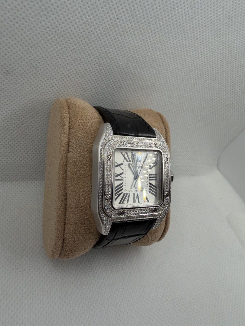 Cartier Santos 100- Medium - Iced Out (Category: Luxury Watches) located in Del Monte. Submitted by antoniomal40766 (Listing ID 1424592216, Image 3). Description: Cartier Santos 100- Medium - Iced Out Movement: Automatic Case material : Ice Out Size: Medium Bracelet material: Leather Condition: 9/10 Comes with: - Box - Paper P295k (negotiable) .