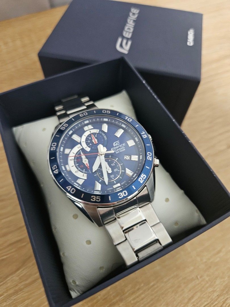 Casio Edifice Chronograph Watch (Category: Men's Watches) located in Dasmarinas. Submitted by prelovedbysoiree (Listing ID 1424702182, Image 2). Description: Casio Edifice watch features a blue dial with chronograph subdials and a stainless steel bracelet. It comes with its original box. The watch has a blue bezel with minute markers. The watch face has luminous hands and markers for easy readability. This is original casio watch.