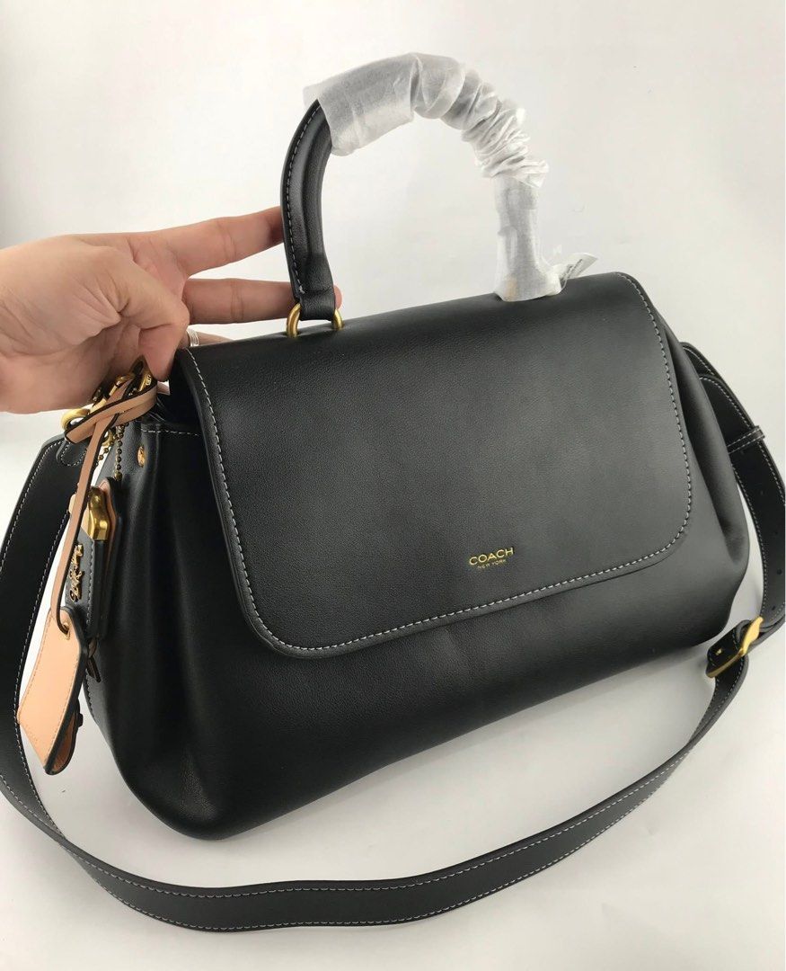 Coach Black Slouchy Rogue Top Handle Bag (Category: Luxury Bags & Wallets) located in Manila. Submitted by lux.mith (Listing ID 1424693524, Image 2). Description: 👌BRAND NEW 🛵COD VIA LALAMOVE / SHIPPING NATIONWIDE 📦WITH PAPER BAG, DUST BAG & CARE CARD 💯LEGIT & TRUSTED ‼️LIMITED STOCKS OWNED BY @LUXMITH.