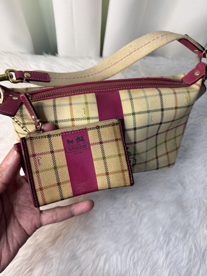 Coach Plaid Handbag with Card Holder (Category: Luxury Bags & Wallets) located in Kabankalan. Submitted by vera.styles (Listing ID 1424533637, Image 3). Description: - Coach handbag with plaid pattern and magenta stripe - Includes a matching card holder - Top zipper closure - Magenta interior - Light beige strap - Gold-toned hardware - Card holder with zipper closure.