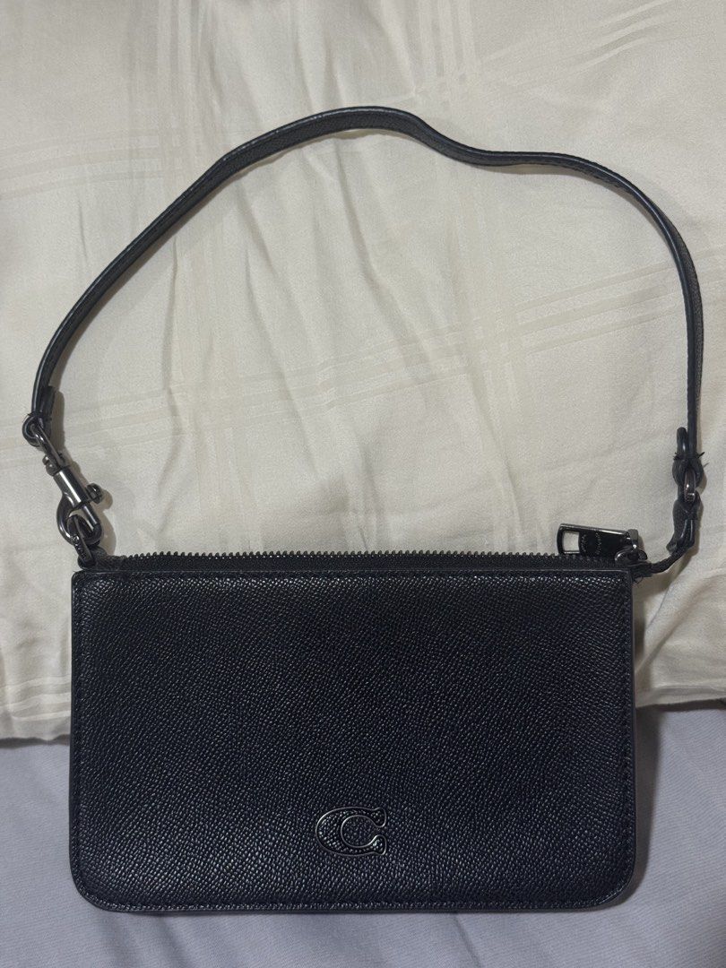 Coach Small Pouch Crossgrain Leather Shoulder Bag (Category: Luxury Bags & Wallets) located in Valenzuela. Submitted by danabananani (Listing ID 1424625723, Image 2). Description: Coach Small Pouch Crossgrain - Bought in Mitsui Outlet Park Jazz Dream in Nagashima - No scratches - No issue with hardware - Issue: lost the tag attached to the bag :( - Barely used - negotiable.