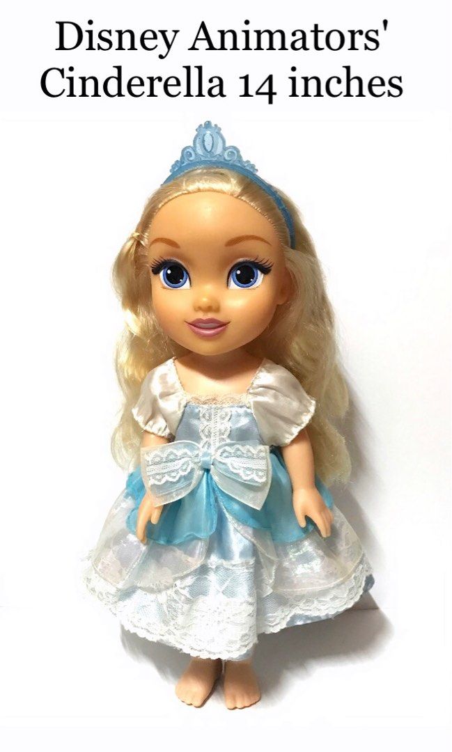 Disney Animators' Cinderella 14 inches (Category: Figurines & Statues) located in Manila. Submitted by iyasellsph (Listing ID 1424629324, Image 1). Description: Disney Animators' Cinderella 👈for photos Very pretty! Cinderella Animators' Doll with Disney markings 14 inches tall Vinyl- hard plastic Long blonde hair with subtle waves Comes with her original ice-blue tiara Make up intact Blue satin and lace dress by Pilot Ink Co. Ltd. No shoes (lost