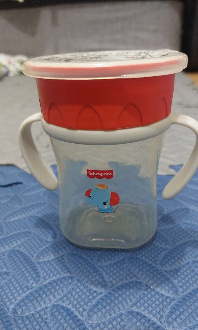 Fisher-Price 360 Degree Sippy Cup/ Training Cup (Category: Weaning & Toddler Feeding) located in Quezon City. Submitted by gracelynmarie (Listing ID 1424646367, Image 2). Description: - Fisher-Price 360 Sippy Cup - 360-degree drinking edge - Spill-resistant design - Easy to clean (no hidden valves) - Fully dismantlable for sterilization - Dishwasher safe (top rack only) - Washed but never used - Original Price: 339.75 Loc: Cubao, QC Mop: Gcash Sf