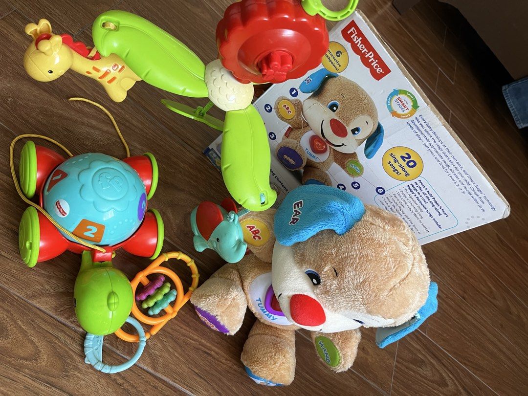 Fisher-Price bundle: Laugh & Learn Puppy (no sound) & Pull Along Turtle (Category: Infant Playtime) located in Muntinlupa City. Submitted by pg53934 (Listing ID 1424534142, Image 1). Description: Fisher price laugh and learn smart stages puppy has no sound and does not light up. This Fisher-Price Pull-Along Turtle is a classic developmental toy. It encourages gross motor skills, balance, and coordination, and the spinning shell helps with early l