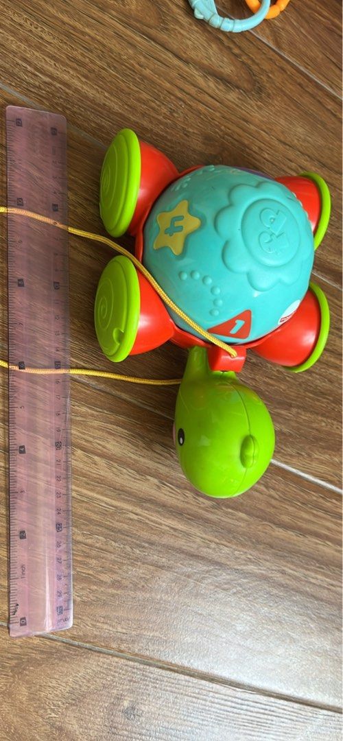 Fisher-Price bundle: Laugh & Learn Puppy (no sound) & Pull Along Turtle (Category: Infant Playtime) located in Muntinlupa City. Submitted by pg53934 (Listing ID 1424534142, Image 3). Description: Fisher price laugh and learn smart stages puppy has no sound and does not light up. This Fisher-Price Pull-Along Turtle is a classic developmental toy. It encourages gross motor skills, balance, and coordination, and the spinning shell helps with early l