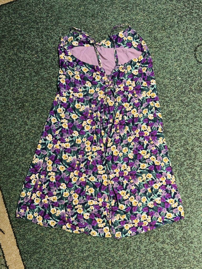 Floral Print Spaghetti Strap Dress (Category: Dresses) located in Quezon City. Submitted by eurekae (Listing ID 1424620852, Image 2). Description: - used once -fits small to medium frame (27-29wl) -Vibrant floral print with purple, yellow, and green flowers - Spaghetti straps - Scoop neckline - Tie-up back detail - Lightweight fabric - Flowing A-line silhouette - Ideal for warm weather.