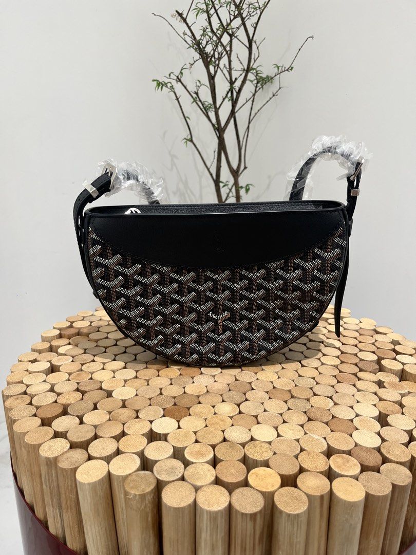 Goyard Paris Sling Bag (Category: Luxury Bags & Wallets) located in Taguig. Submitted by raraofpursemaison (Listing ID 1424597408, Image 1). Description: Goyard Hirondelle in Black 9/10 condition with creasing on the leather part Inclusions: paper bag, dust bag, gift receipt, tag, booklet and Entrupy certificate .
