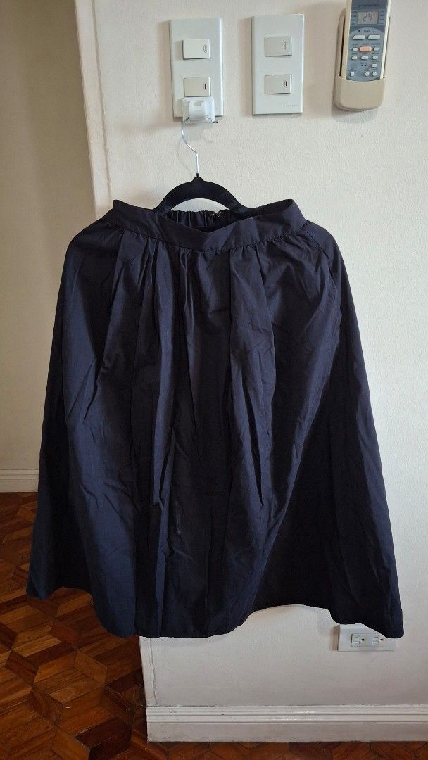 GU Pleated Skirt - Size S (Category: Skirts) located in Las Pinas. Submitted by mgr29 (Listing ID 1424612244, Image 2). Description: black pleated skirt from GU. Features a size S. Made with a shell of 60% polyester and 40% wool. The lining is 100% recycled polyester. The skirt has a classic design, suitable for various occasions. It is a versatile piece that can be dressed up or down..