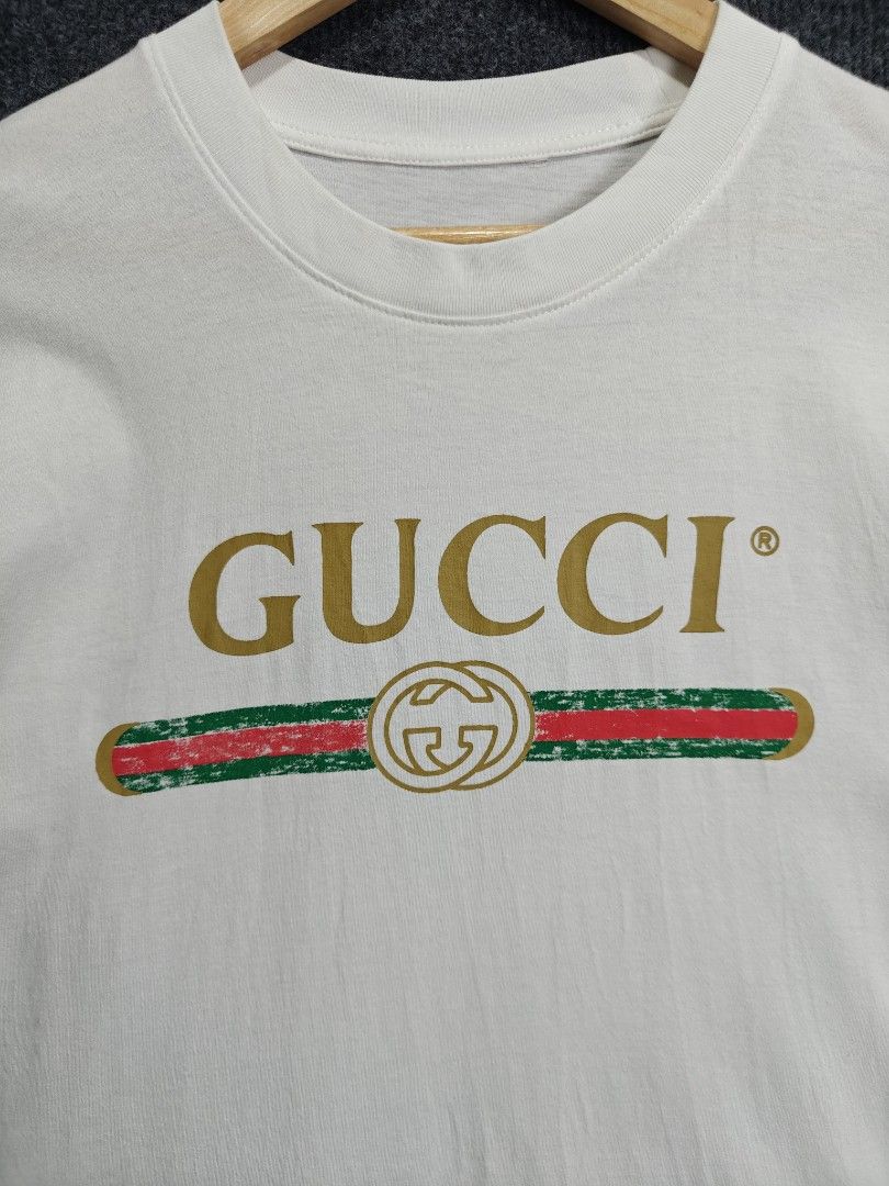 SALE ❗Gucci Logo T-shirt (Category: Tshirts & Polo Shirts ) located in Alaminos. Submitted by epargne (Listing ID 1424600778, Image 3). Description: 🏷️ Gucci Condition: Vgood ! Color rate: 9.5/10 Size : Medium - Large Measurement: ⬇️⬇️⬇️ 'Length' 27.5 - 'Width' 22 Issue: Cut maintag See picture for details ⬇️⬇️⬇️.