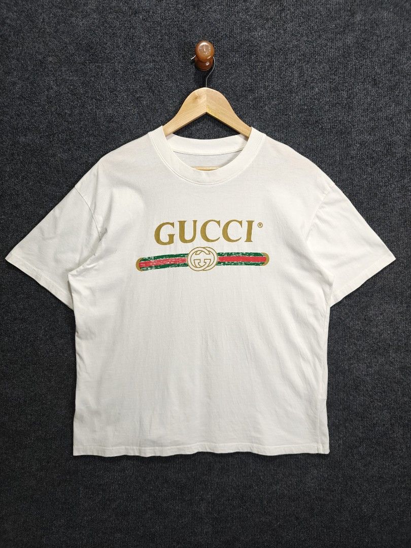 SALE ❗Gucci Logo T-shirt (Category: Tshirts & Polo Shirts ) located in Alaminos. Submitted by epargne (Listing ID 1424600778, Image 1). Description: 🏷️ Gucci Condition: Vgood ! Color rate: 9.5/10 Size : Medium - Large Measurement: ⬇️⬇️⬇️ 'Length' 27.5 - 'Width' 22 Issue: Cut maintag See picture for details ⬇️⬇️⬇️.