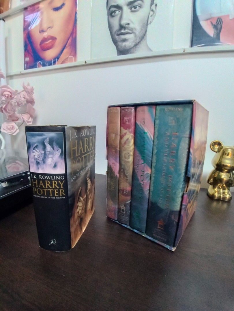 Harry Potter Book Set (Category: Storybooks) located in Dasmarinas. Submitted by solstice.style (Listing ID 1424700531, Image 1). Description: Set of Harry Potter books, including "Harry Potter and the Sorcerer's Stone", "Harry Potter and the Chamber of Secrets", "Harry Potter and the Goblet of Fire", and "Harry Potter and the Order of the Phoenix". The books are in a box set. The covers feature illustrations of Harry Potter and other characters.