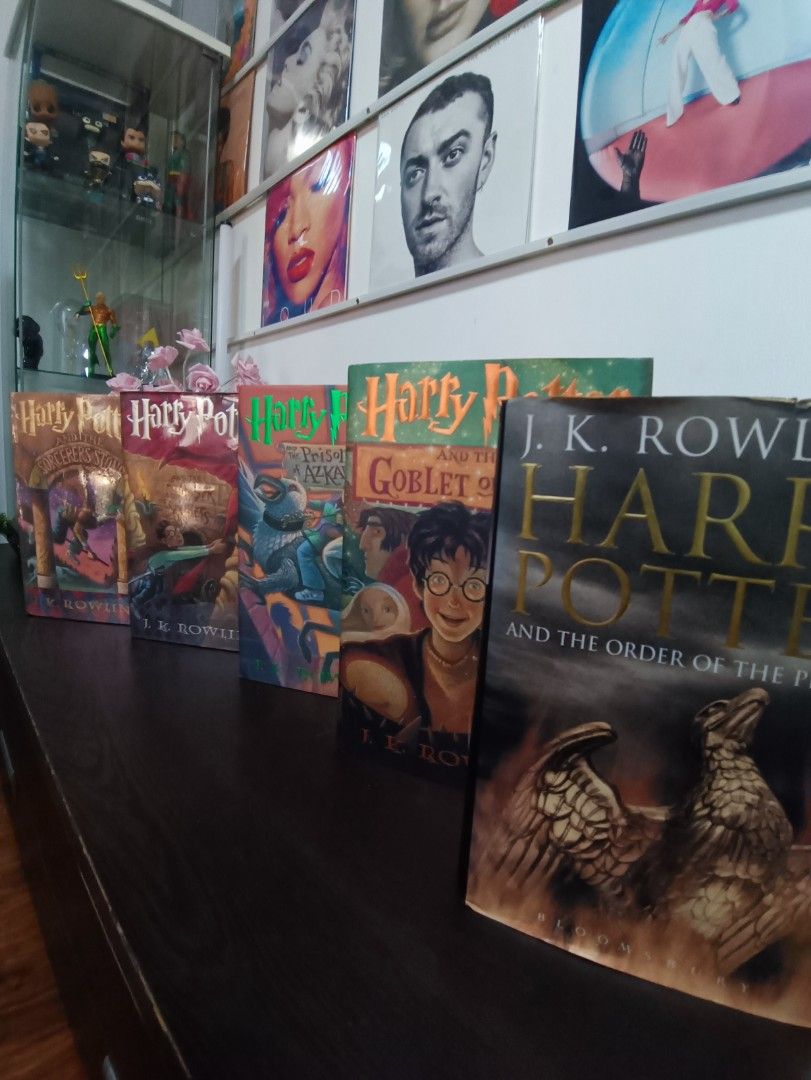 Harry Potter Book Set (Category: Storybooks) located in Dasmarinas. Submitted by solstice.style (Listing ID 1424700531, Image 3). Description: Set of Harry Potter books, including "Harry Potter and the Sorcerer's Stone", "Harry Potter and the Chamber of Secrets", "Harry Potter and the Goblet of Fire", and "Harry Potter and the Order of the Phoenix". The books are in a box set. The covers feature illustrations of Harry Potter and other characters.