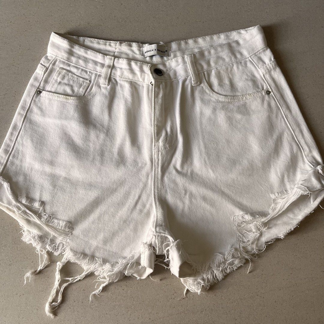 Highwaisted Distressed White Denim Shorts (Category: Shorts) located in Santa Rosa. Submitted by blancrealm (Listing ID 1424669685, Image 1). Description: - Highwaisted white denim shorts - Brand: Monica's Secret - Size: L - Distressed hem design.