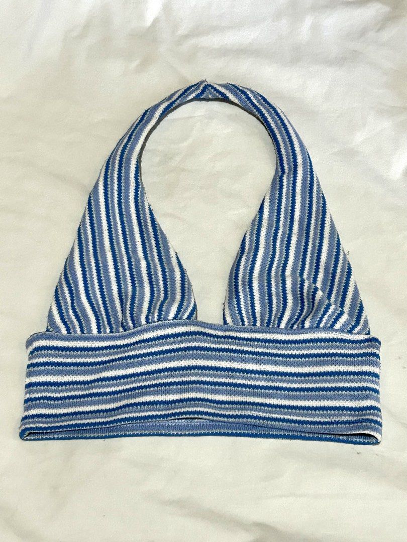 H&M Striped Blue & White Halter Top - Size S (Category: Sleeveless) located in Caloocan City. Submitted by ctrl12 (Listing ID 1424564225, Image 1). Description: - In blue and white stripes. - Classic halter neck design - Fitted bodice - Knit fabric - Stylish for summer, warm weather or layering Features a halter neck design and a ribbed texture. The tag indicates a size S. MOP: GCash MOD: Lalamove / J&T Helping tags: urban outfitters zara uniqlo 