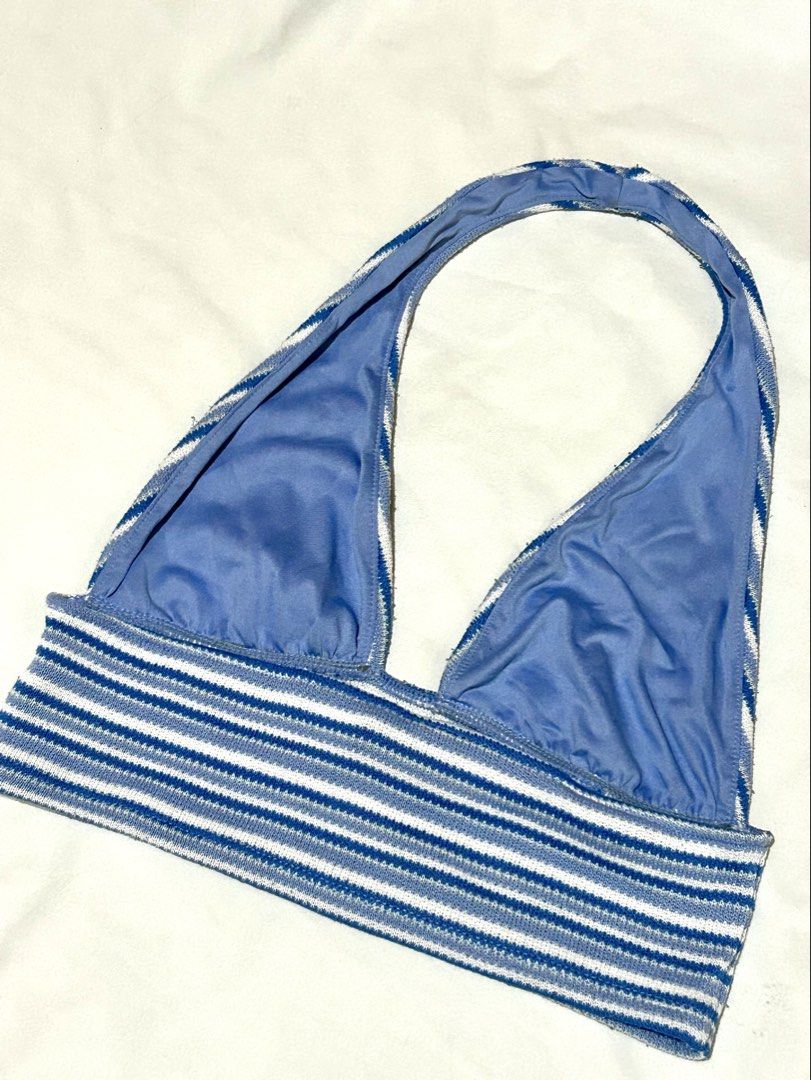 H&M Striped Blue & White Halter Top - Size S (Category: Sleeveless) located in Caloocan City. Submitted by ctrl12 (Listing ID 1424564225, Image 2). Description: - In blue and white stripes. - Classic halter neck design - Fitted bodice - Knit fabric - Stylish for summer, warm weather or layering Features a halter neck design and a ribbed texture. The tag indicates a size S. MOP: GCash MOD: Lalamove / J&T Helping tags: urban outfitters zara uniqlo 